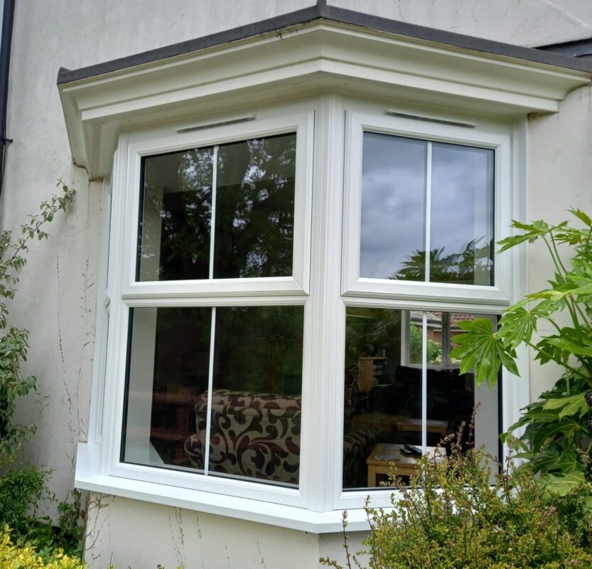 white bay windows